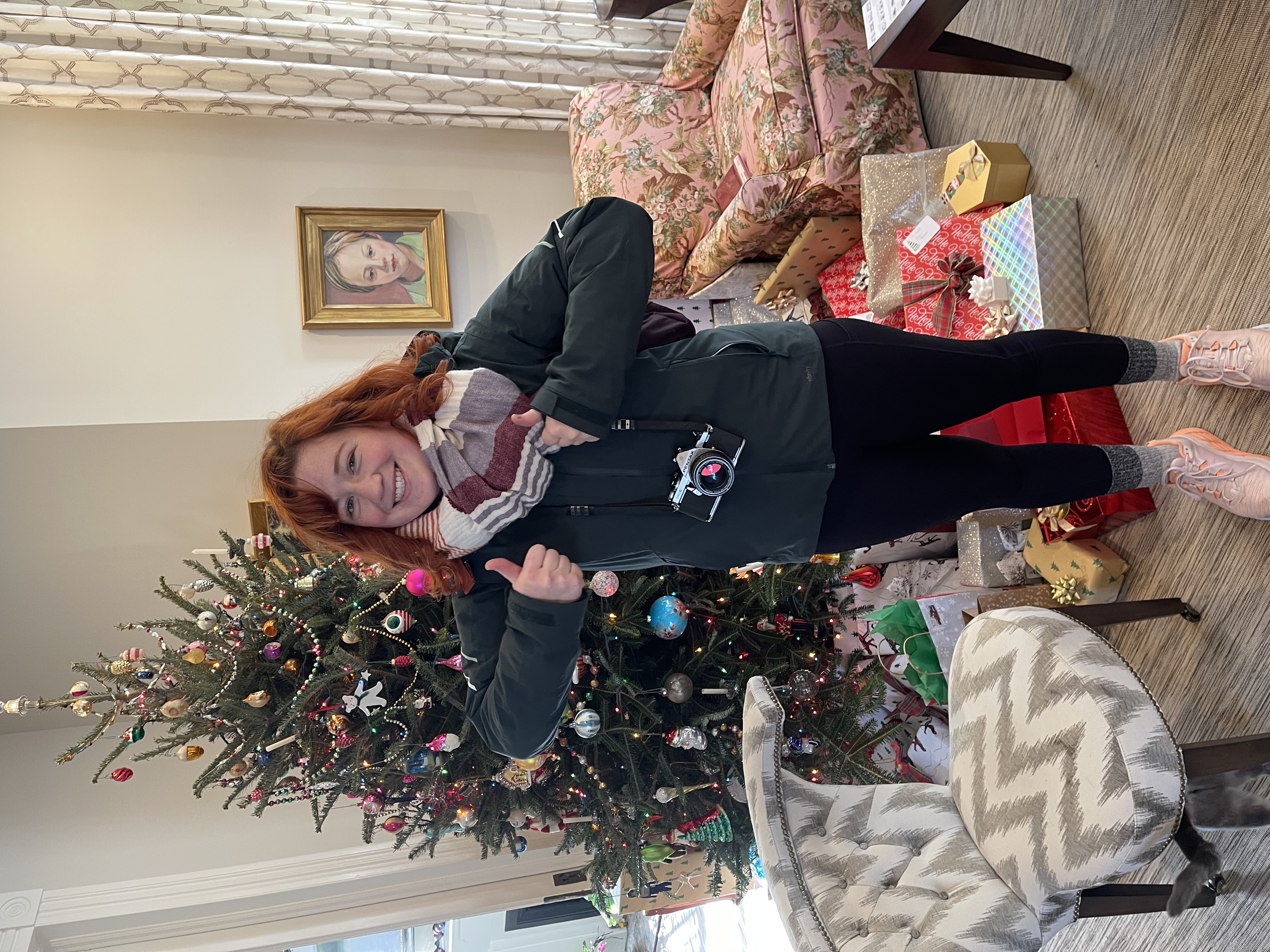 Madison with her new camera, bundled up and ready to face the arctic blast