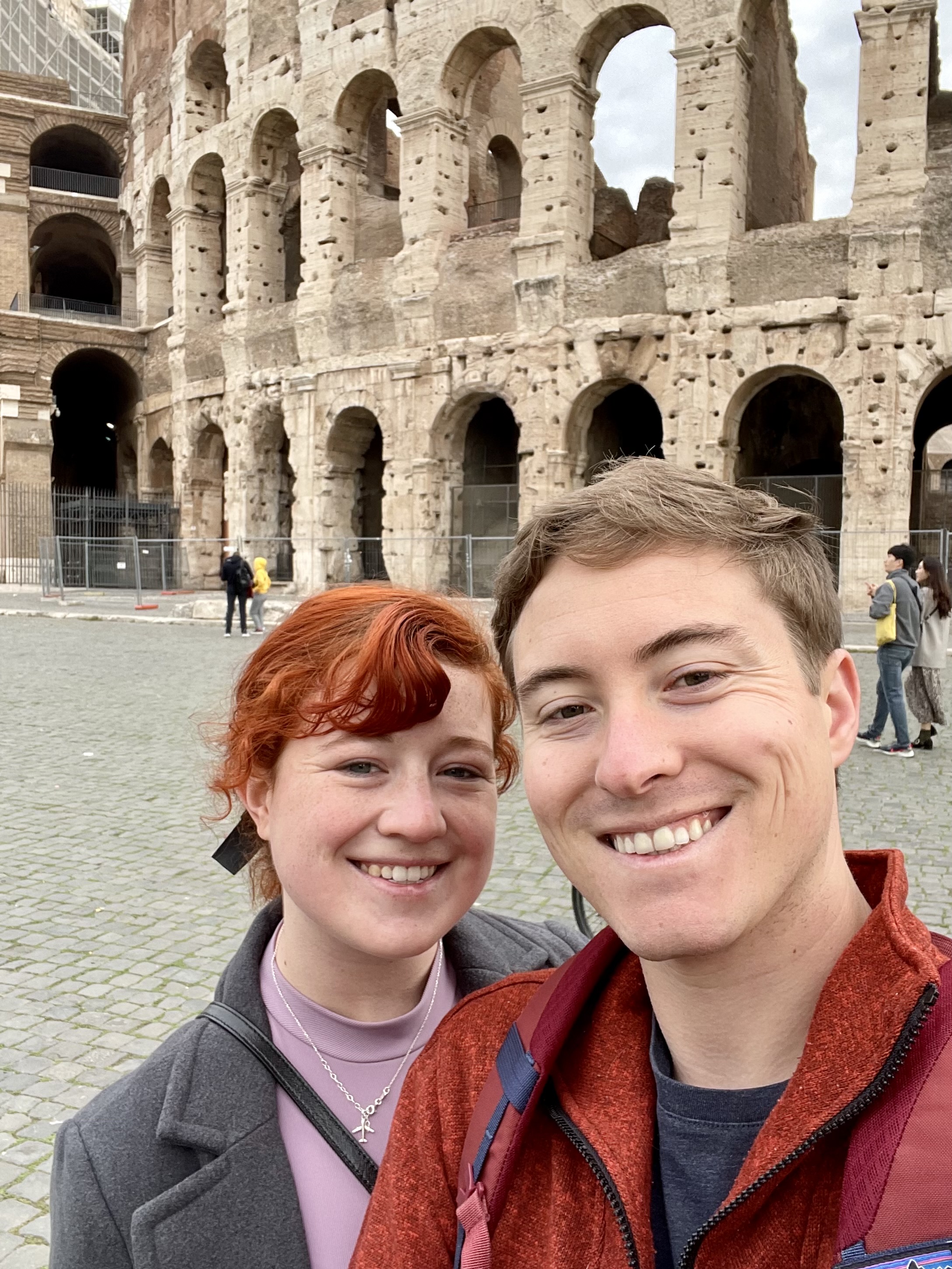 Standing outside of the Colosseum